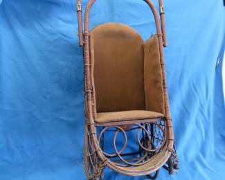 Lot 305. 1902 Withrow Oriole wicker baby carrier