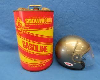 Lot 378. Vintage snowmobile Stancan 6.5 gallon steel gas can and a 6 7/8-7" Bell helmet.