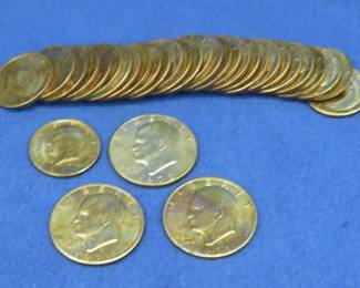 Lot 190. 30 clad Kennedy halves and three Eisenhower dollars
