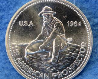 Lot 332. 1984 Engelhard silver round. One ounce of .999 fine silver.
