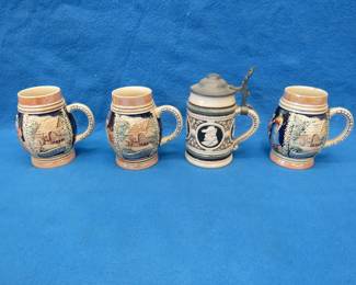 Lot 206. Three beer mugs and one stein