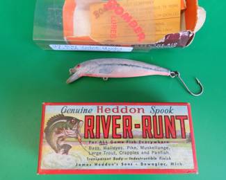 Lot 291. Vintage Heddon 2 1/2" River Runt in a box marked "9110-SD standard" both in excellent condition, and a Bomber 3 1/2" minnow in a box with papers.