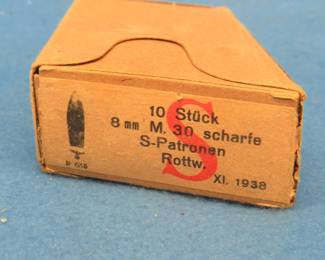 Lot 271. WW2 era German 8mm ammunition in original sleeve. Includes Waffenamt stamp.