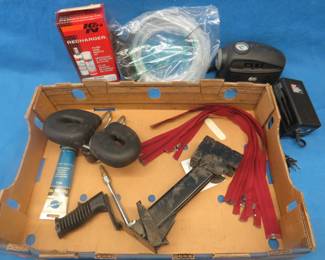 Lot 390. 12-volt air compressor, bicycle seat, and more