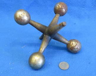 Lot 157. Large decorative chrome-plated cast iron toy jack.