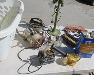 Lot 173. Lamp base, wall decorations, wooden spool, and more, plus tote