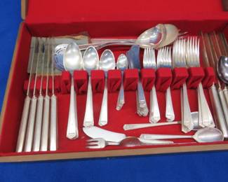 Lot 389. Rogers Brothers anniversary pattern dinnerware set