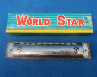 Lot 355. Tombo World Star faux tremolo 16-hole harmonica made in Japan.
