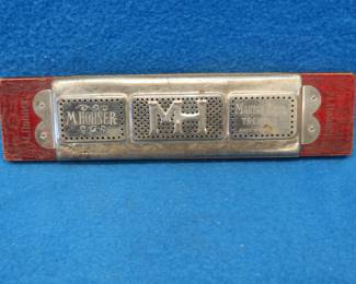Lot 223. Hohner 40-hole double-sided tremolo harmonica. Sounds great.