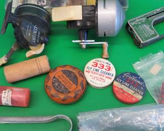 Lot 30. Fishing Tackle: Johnson Century reel - stuck. Metal Langley scale. Box of Mepps spinners. Akron 532 reel. And more.
