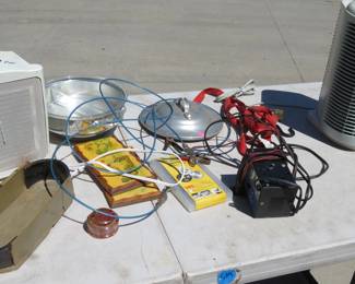 Lot 240. Heater, fan, battery charger, tote, and more