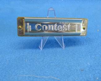 Lot 63. Schunk Contest 10-hole diatonic harmonica in the key of C. Sounds great.