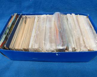 Lot 182. Hundreds of Golden Era postcards both used and unused going back to the early 1900s. RRPCs, town views, souvenir cards, and more