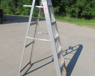 Lot 297. 6' tall folding aluminum ladder