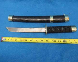 Lot 70. Three-sword set with scabbards and display stand