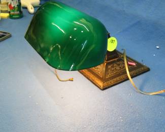 Lot 137. Library lamp with repaired shade