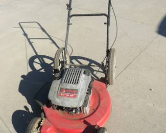 Lot 148. MTD Lawn Chief 5 HP push mower. 22" cut. Has compression.