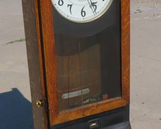 Lot 13. Antique International Time Recording Company time clock in oak case, missing keys, but otherwise appears complete with pendulum, untested. 44" x 16" x 11 1/2"