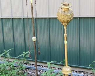 Lot 315. Old metal oil floor lamp and a vintage copper 60" floor lamp