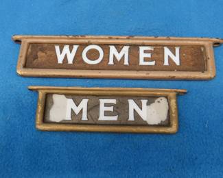 Lot 25. Vintage glass restroom signs in cast iron frames