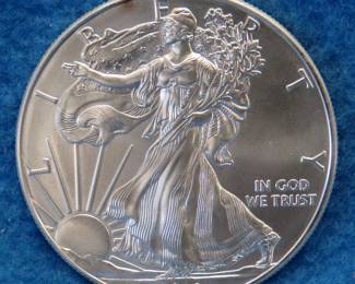 Lot 414. 2012 American Silver Eagle. One ounce of .999 fine silver.