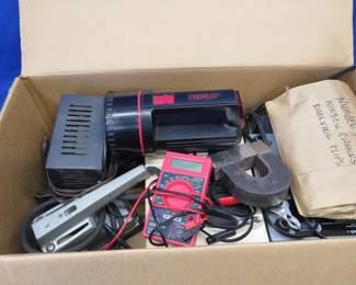 Lot 327. Vintage sabre saw and sander, battery charger, and more
