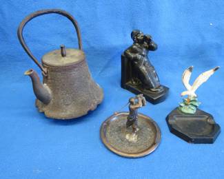Lot 133. Antique cast iron teapot with Asian makers mark