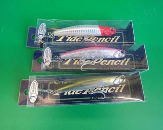 Lot 285. Three NIP 3 1/2" Tide Pencil baits