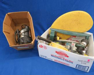 Lot 387. Yard care items such as sprinkers and sprayers, a submersible pump that powered up, and more