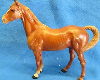 Lot 136. Old Cast iron horse.