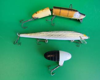 Lot 286. Vintage Herter's 5 1/4" Minnow, and a 4 5/8" wooden Jointed Vamp; and an unidentified 1 7/8" bait.