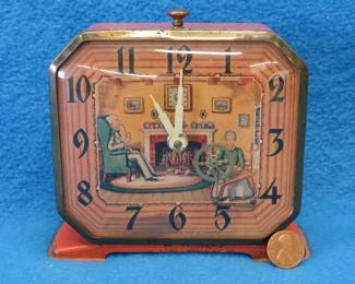Lot 53. Lux animated clock with a working spinning wheel