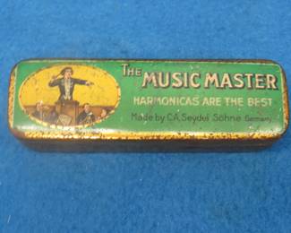 Lot 358. Seydel The Music Man. Tin only.