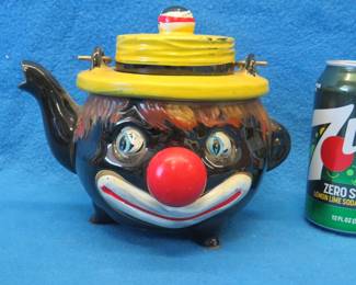 Lot 205. Black Americana teapot. Made in Japan and hand-painted.