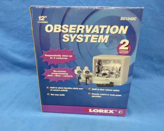 Lot 142. Lorex 12" observation system. Includes monitor and two cameras. Appears to be unused.