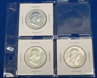 Lot 195. Three Franklin half-dollars