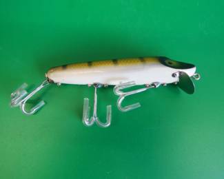 Lot 287. Vintage Heddon "wood 4 5/8" Basser in excellent condition in a box marked 7500 M Vamp