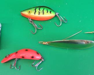 Lot 113. Three vintage baits all in boxes. Heddon Tiny Tad, Storm Lil Tex, and Johnson's Gold Minnow