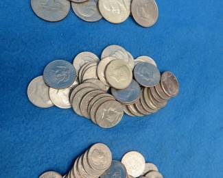 Lot 28. US coinage: 8 Eisenhower dollar coins. 33 clad Kennedy halves. One 40% silver Kennedy half. 27 Susan B. Anthony dollar coins. Total of $52.00 face value