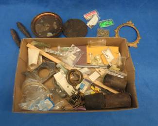 Lot 349. Clock parts including weights, extremely small screws, and more.