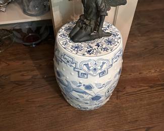 Blue and white garden bench with dragon
