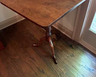 Antique mahogany tilt top table with antique butterfly repair on reverse of top.