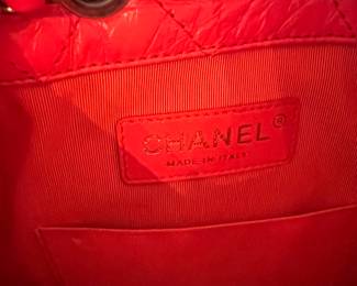 63. Vintage Chanel Orange Gabrielle Quilted Small Backpack  (8" x 3" x 9") 