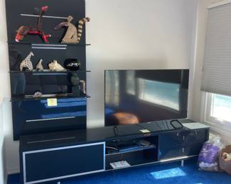 Black entertainment center and Oaxaca animals - monsters