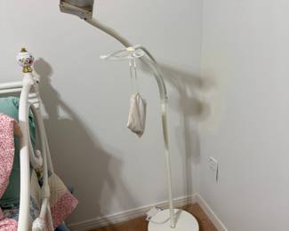 One of 2 magnified floor lamps