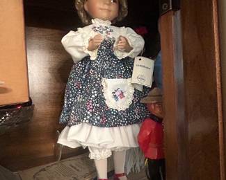 Vintage Goldilocks doll with a bowl of porridge 