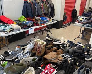 Lots of shoes and youth jackets.
