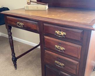 Leather top desk.
