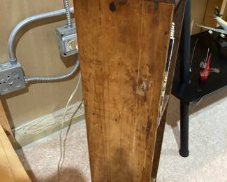 Antique drawer converted into a standing storage/ display case.