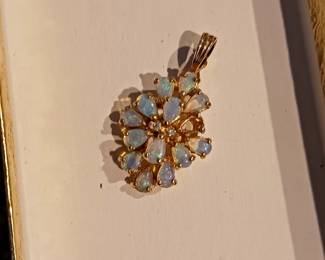 10k gold and opal pendant.